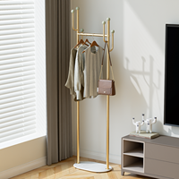 Porte-manteau sur pied de style poteau doré, style luxe léger, pour chambre et entrée, avec support pour sacs et base en verre trempé