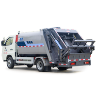 Le prix du petit camion à ordures à compression électrique Foton 5m3, avec une autonomie de 322km, est un véhicule de collecte des ordures au sous-sol