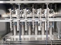 Machine automatique de remplissage, de bouchage et d'étiquetage de bouteilles d'huile comestible de tournesol, d'olive, de légumes, d'arachide, de noix de coco