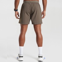 Logo personnalisé Fitness Shorts de course Shorts d'athlétisme d'entraînement Hommes Shorts de gymnastique en nylon tissé