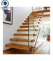 Garde-corps moderne en acier inoxydable avec colonne montante ouverte pour escalier rond incurvé Escalier flottant Escalier blanc de luxe pour maison/villa
