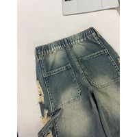Jean déchiré pour homme, coupe droite, effet vieilli, bords bruts, style vintage, streetwear décontracté Y2K, vente en gros, nouveau modèle de créateur