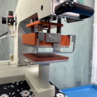 Presse à chaud numérique pneumatique haute efficacité 10x10cm pour l'étiquetage personnalisé de vêtements et logos sur T-shirts en usine