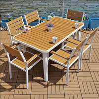 Meubles de restaurant d'extérieur modernes résistants aux intempéries, chaise et table de salle à manger en plastique et bois pour patio