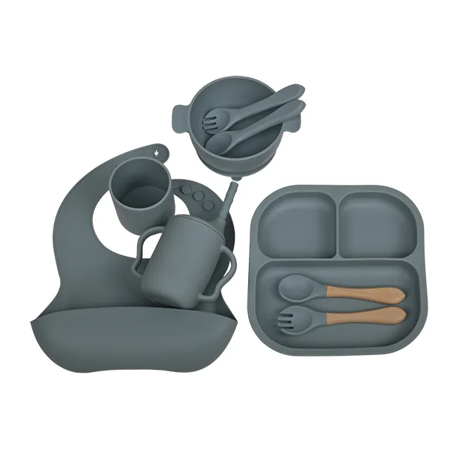 Assiette en silicone réutilisable souple personnalisée en gros ensemble de salle à manger en caoutchouc sans BPA cuillère tasse à bavoir imperméable pour enfant