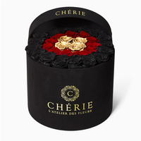 Vente en gros de boîte cadeau d'emballage de fleur rigide noire en papier de carton rond de luxe personnalisé avec ruban