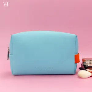 hot sale blue travel storage portable leather cosmetic bag with bottle packaging