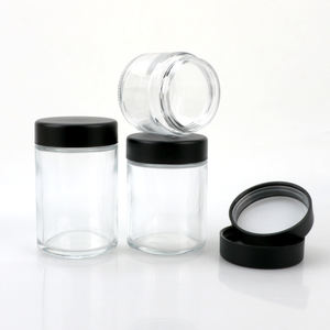 Vente en gros de pots en verre transparents ronds de 2 oz (60 ml) pour cosmétiques, emballages de fleurs, avec couvercles à l'épreuve des enfants - Product Image 1