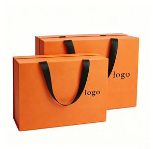 Custom <b>Orange</b> <b>Paper</b> Shopping Bags With Black Handles Offset Printing Recyclable Art <b>Paper</b> Business Gift Packaging - Product Image 1