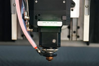 Machine de découpe laser à fibre haute puissance avec plateforme d'échange intégrée pour la découpe de métaux