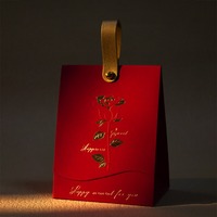 Boîte en papier de spécialité rose dorée Boîte à bonbons de mariage pour mariages Sac cadeau de bonbons imprimé avec poignée