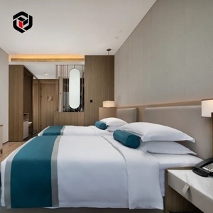 Ensemble complet de mobilier d'hôtel haut de gamme et moderne, fabriqué en usine, comprenant une tête de lit sur mesure en bois massif et une armoire fonctionnelle pour appartement élégant. - Product Image 4