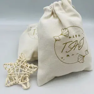 Bolsa de almacenamiento con cordón de algodón y lona natural al por mayor, pequeña bolsa de regalo personalizada con estampado de logotipo dorado