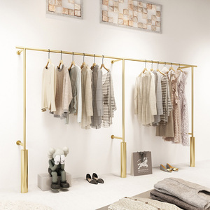 Estante <span class=keywords><strong>de</strong></span> exhibición independiente <span class=keywords><strong>de</strong></span> acero inoxidable dorado <span class=keywords><strong>de</strong></span> Maniquí <span class=keywords><strong>de</strong></span> <span class=keywords><strong>ropa</strong></span> <span class=keywords><strong>de</strong></span> lujo moderno boutique personalizado para tienda <span class=keywords><strong>de</strong></span> <span class=keywords><strong>ropa</strong></span> - Product Image 1