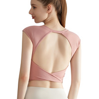 Camiseta sin mangas para yoga con almohadillas de sujetador integradas, de largo completo, que cubre el abdomen, de alta resistencia a impactos y con diseño trasero que realza la figura.