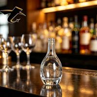 Bouteille à liqueur en verre de qualité supérieure, surface lisse et base stable pour une utilisation et un rangement faciles