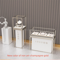 Vitrine à bijoux avec éclairage LED, support en métal et comptoir en verre pour vitrine de magasin