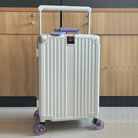 Valise de voyage surdimensionnée de 26 pouces, construction en aluminium, roues pivotantes silencieuses et serrure à code TSA sécurisée