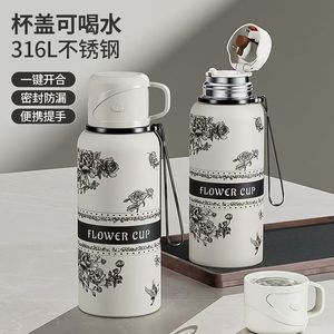 Botella de agua aislada Flower Cup, de acero inoxidable 316, de gran capacidad, termo de viaje con tapa para beber. - Product Image 1