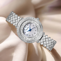 Montre-bracelet de luxe pour femme en argent avec diamants sertis, mouvement à quartz en zircon cubique complet, style hip-hop, bracelet en laiton