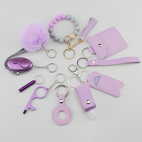 Ensemble de porte-clés de sécurité promotionnels en gros Alarme personnelle Pom Pom Ball Bracelet en silicone DIY 11PCS Ensemble de porte-clés d'autodéfense