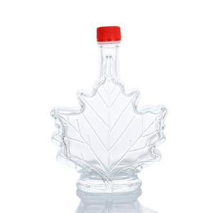 Bouteille de sirop en verre en forme de feuille d'<span class=keywords><strong>érable</strong></span> 50ml 100ml 250ml Bouteille de liqueur en verre avec bouchon <span class=keywords><strong>à</strong></span> vis pour <span class=keywords><strong>l</strong></span>'emballage de spiritueux Vodka - Product Image 5