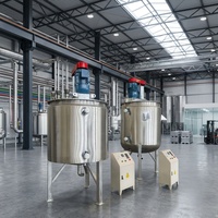 Cuve de mélange en acier inoxydable monocouche avec agitateur à ancre et à pales, pompe, moteur et chauffage électrique pour la cuisson et le mélange du chocolat