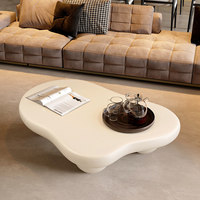 Table basse en bois style nuage crémeux à pattes sphériques |   Utilisation domestique dans le salon |   Petit format idéal pour les appartements - Forme irrégulière