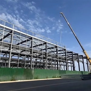 Maison à structure en acier moderne avec portes coulissantes intégrées, systèmes de volets roulants, conception d'atelier de traitement électronique textile - Product Image 3