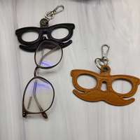 Nouveau support créatif en cuir PU pour lunettes de soleil, organisateur de lunettes, breloque de sac à lunettes pour homme élégant