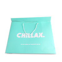 Bolsas de papel de Tarjeta blanca con logotipo personalizado verde reciclado de lujo para embalaje de zapatos
