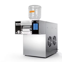 Petite machine commerciale de comptoir pour la fabrication de neige, de flocons de neige, de crème pilée, de glace pilée, de shaver ice et de Bingsu
