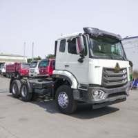 Тягач Sinotruk NX Tx 6X4, тяжелый, 40т, б/у, HOWO, дизель Евро-2, леворульный, двигатель Weichai, 10 шин