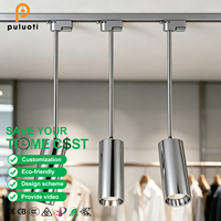 Spot LED sur rail cylindrique argenté à longue tige suspendue, éclairage sain pour vitrine de magasin, galerie, usage commercial intérieur
