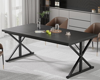 Table à manger industrielle en bois noir mat avec pieds en X inclinés et barre transversale en acier pour la maison, le bureau ou l'atelier