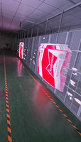 Écran LED transparent à grille haute perméabilité pour affichage LED sur murs-rideaux en verre et vitrines de centres commerciaux