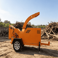 Broyeur de bois hydraulique de 22,8 kW à louer avec attache rapide pour un accrochage fréquent à la remorque