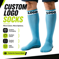 Chaussettes de football montantes confortables et antibactériennes pour enfants, en mélange de coton tricoté sur mesure, avec grip sportif et bordure, idéales pour l'été