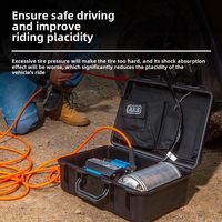 Compresseur d'air portable à double cylindre et pompe noir/bleu/argent pour le gonflage des pneus des véhicules tout-terrain dans le désert et la neige