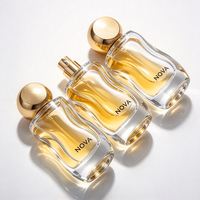 Flacon de parfum de luxe en verre 30ml 50ml avec bouchon sphérique doré, pulvérisateur, finition mate givrée, gravure, sérigraphie, décalcomanie, tendance