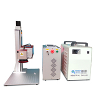 Machine de marquage laser UV fendue de bureau de gobos de refroidissement par eau de 3W 5W 10W pour marqueur de bouteille de parfum en verre avec une longueur d'onde de 355nm