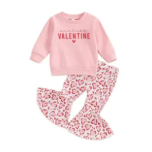 2024 all'ingrosso Set di abbigliamento per ragazze Boutique felpa pantaloni a zampa di campana con cuore di san valentino abiti per bambini