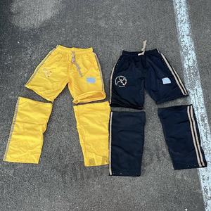 Pantalones de chándal convertibles personalizados de verano para hombre, pantalones deportivos holgados con bordado de pierna ancha de nailon y poliéster para correr para hombre - Product Image 1