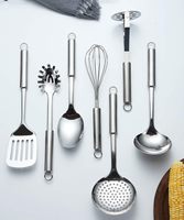 Ensemble d'ustensiles de cuisine 4 pièces en acier inoxydable argenté avec spatule, louche à soupe et écumoire, isolation thermique