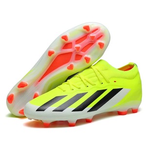 Botas de fútbol FG/TF al por mayor OEM/ODM para adultos y jóvenes, con opciones antideslizantes, ligeras y transpirables de tejido. - Product Image 1