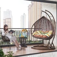 Ensemble trois pièces minimaliste personnalisable en acier inoxydable pour extérieur : table, chaise et balançoire suspendue de type nid d'oiseau pour jardin et cour