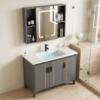 Meuble-lavabo de salle de bain moderne noir et or en aluminium, avec vasque encastrée en pierre frittée, miroir intelligent LED anti-buée et armoire