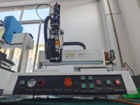 Distributeur de points de colle rotatif automatique à deux composants à quatre axes R pour la fixation de pièces électroniques LCD PCB