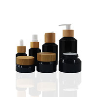 Bouteilles et bocal d'huile essentielle cosmétique noire de 100ml 30ml 60ml 200ml ensemble complet flacon compte-gouttes en verre avec vaporisateur et pipette