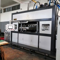 Machine automatique de moulage de pâte à papier pour la production de contenants alimentaires biodégradables en bagasse